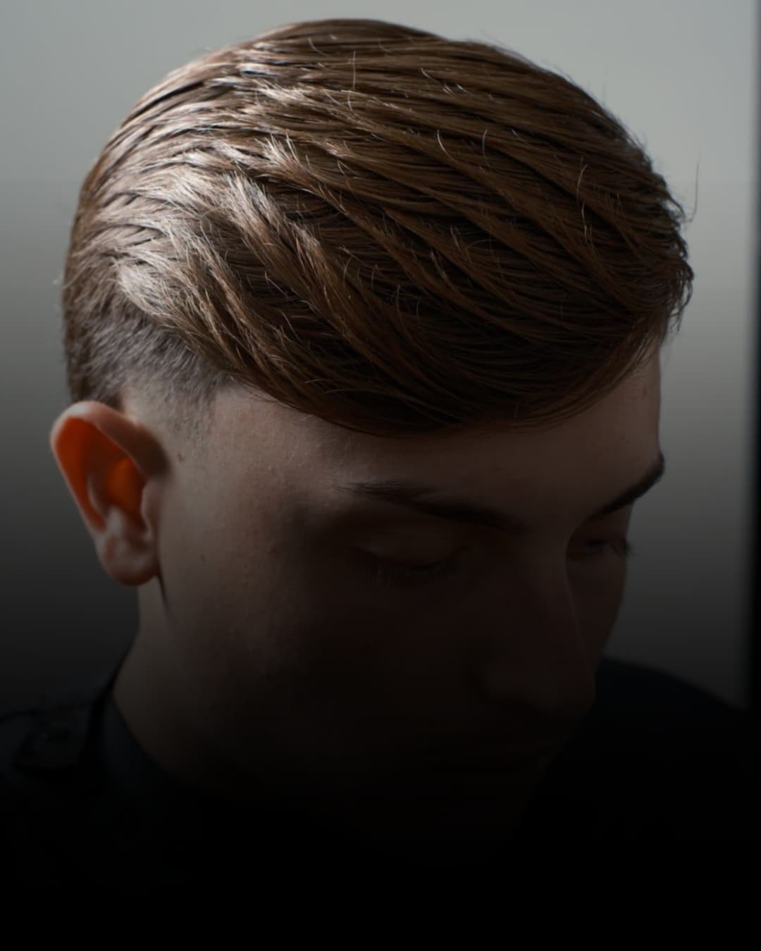 Taglio ragazzo con riga laterale